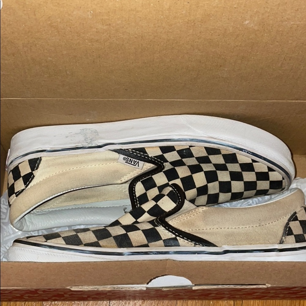 Checkerboard slip on vans
